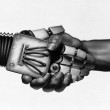 mains de robot et d'être humain